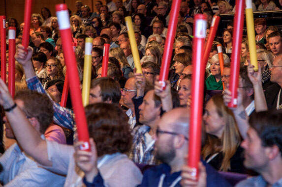 Conference-ideas 
 Hundreds of conference delegates with boomwhackers at conference energiser in Norway